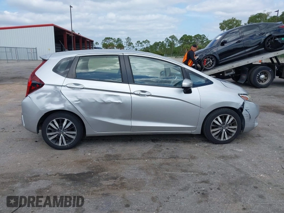 2016 Honda Fit EX with VIN JHMGK5H74GX000882, listed as a IAAI auction lot 42091641 with 64,210 mi miles and . Bid and sale history available at DreamBid. Image 13.