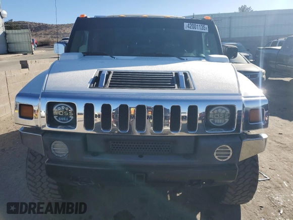 2004 Hummer H2 with VIN 5GRGN23U64H121213, listed as a Copart auction lot 42001135 with 0 mi miles and Salvage Title. Bid and sale history available at carsss.com. Image 5.