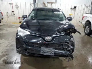 2018 Toyota RAV4 LE with VIN 2T3BFREV6JW763007, listed as a Copart auction lot 58604545 with 107,683 mi miles and Salvage title. Bid and sale history available at DreamBid. Image 5.