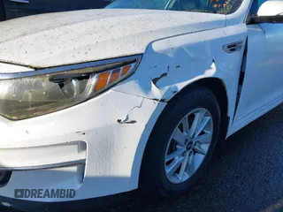2016 Kia Optima LX with VIN 5XXGT4L31GG034993, listed as a IAAI auction lot 41881231 with 81,888 mi miles. Bid and sale history available at carsss.com. Image 6.