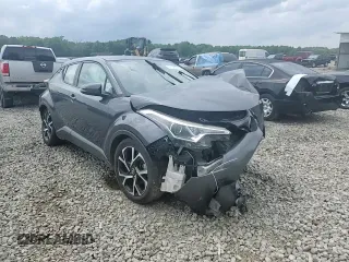 2018 Toyota C-HR XLE z VIN NMTKHMBX7JR004515, wystawiony jako Copart lot #57106385 z przebiegiem Nie podano mil oraz Szkoda całkowita • Salvage title. Historia ofert i sprzedaży dostępna na DreamBid. Obrazek 14.