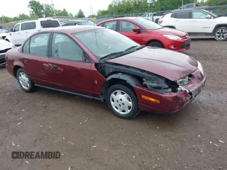 2001 Saturn SL z VIN 1G8ZG52821Z290428, wystawiony jako IAAI lot #42204275 z przebiegiem 171 478 mil mil oraz . Historia ofert i sprzedaży dostępna na DreamBid. Obrazek 1.