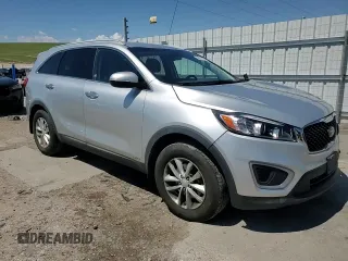 2017 Kia Sorento LX z VIN 5XYPGDA3XHG236574, wystawiony jako Copart lot #56359835 z przebiegiem 105 297 mil mil oraz Szkoda całkowita • Salvage title. Historia ofert i sprzedaży dostępna na DreamBid. Obrazek 14.