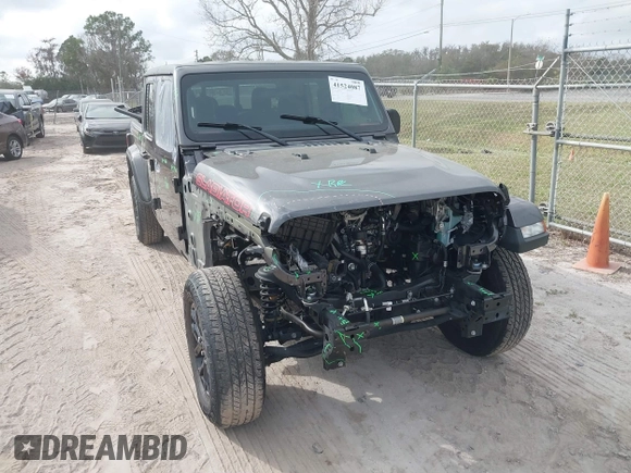 2022 Jeep Gladiator Texas Trail z VIN 1C6HJTAG0NL162804, wystawiony jako IAAI lot #41524087 z przebiegiem 17 652 mil mil oraz . Historia ofert i sprzedaży dostępna na DreamBid. Obrazek 6.