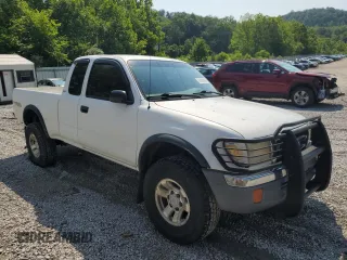 1999 Toyota Tacoma PreRunner with VIN 4TASN92NXXZ551335, listed as a Copart auction lot 62199645 with 198,754 mi miles and Salvage title. Bid and sale history available at DreamBid. Image 4.