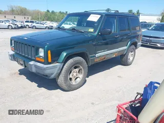 2000 Jeep Cherokee z VIN 1J4FF48S2YL253251, wystawiony jako IAAI lot #42243268 z przebiegiem 154 136 mil mil oraz . Historia ofert i sprzedaży dostępna na DreamBid. Obrazek 2.
