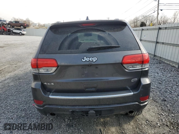 2014 Jeep Grand Cherokee Overland with VIN 1C4RJFCG4EC172361, listed as a Copart auction lot 49053155 with 144,916 mi miles and Salvage Title. Bid and sale history available at DreamBid. Image 6.
