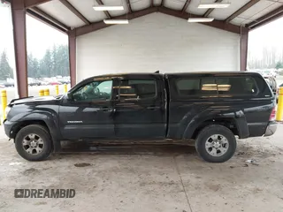 2015 Toyota Tacoma with VIN 3TMMU4FN1FM086408, listed as a IAAI auction lot 41320197 with 161,356 mi miles and . Bid and sale history available at DreamBid. Image 14.