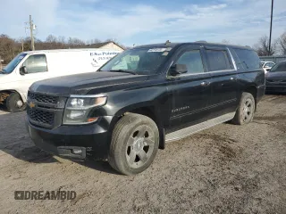 2015 Chevrolet Suburban LTZ with VIN 1GNSKKKC7FR125739, listed as a Copart auction lot 44774175 with 176,287 mi miles and Salvage title. Bid and sale history available at DreamBid. Image 1.