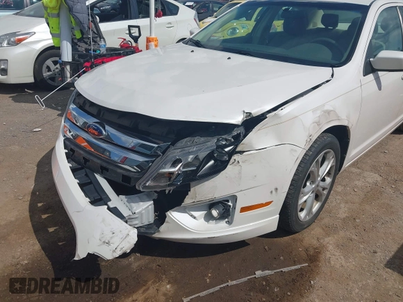 2012 Ford Fusion SE with VIN 3FAHP0HG8CR160797, listed as a IAAI auction lot 42619480 with 106,511 mi miles and . Bid and sale history available at DreamBid. Image 6.