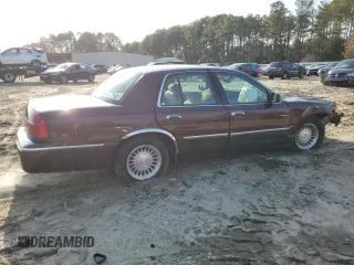 2001 Mercury Grand Marquis LS z VIN 2MEFM75W41X706118, wystawiony jako Copart lot #84484434 z przebiegiem 104 946 mil mil oraz Szkoda całkowita • Salvage title. Historia ofert i sprzedaży dostępna na DreamBid. Obrazek 3.
