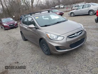 2013 Hyundai Accent GS z VIN KMHCT5AE9DU088357, wystawiony jako IAAI lot #41683580 z przebiegiem 122 414 mil mil oraz . Historia ofert i sprzedaży dostępna na DreamBid. Obrazek 1.