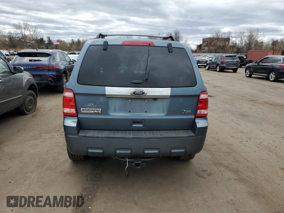 2011 Ford Escape Limited with VIN 1FMCU9EGXBKB51054, listed as a Copart auction lot 53447125 with 133,342 mi miles and Salvage Title. Bid and sale history available at DreamBid. Image 6.