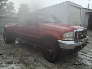 2002 Ford F-350 XL z VIN 1FTWX33FX2EB85896, wystawiony jako Copart lot #58554815 z przebiegiem 286 347 mil mil oraz Szkoda całkowita • Salvage title. Historia ofert i sprzedaży dostępna na DreamBid. Obrazek 4.