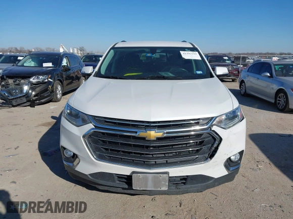 2018 Chevrolet Traverse LT Cloth z VIN 1GNERGKW9JJ214512, wystawiony jako IAAI lot #41397519 z przebiegiem 100 342 mil mil oraz . Historia ofert i sprzedaży dostępna na DreamBid. Obrazek 12.