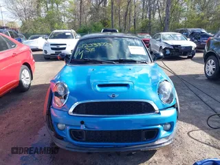2013 MINI Coupe S with VIN WMWSX3C55DT466604, listed as a IAAI auction lot 42033723 with 109,814 mi miles and . Bid and sale history available at DreamBid. Image 11.