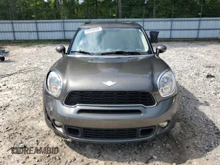 2014 MINI Countryman S with VIN WMWZC3C57EWP25099, listed as a Copart auction lot 62646555 with 153,059 mi miles and Salvage title. Bid and sale history available at DreamBid. Image 5.