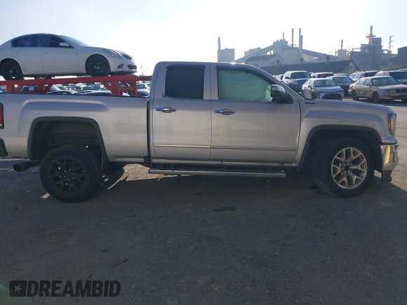 2017 GMC Sierra 1500 SLT z VIN 1GTV2NEC6HZ102412, wystawiony jako IAAI lot #41170633 z przebiegiem 163 321 mil mil oraz . Historia ofert i sprzedaży dostępna na DreamBid. Obrazek 13.
