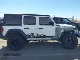 2020 Jeep Wrangler Unlimited Sport with VIN 1C4HJXDG0LW174393, listed as a IAAI auction lot 41575040 with 68,418 mi miles and . Bid and sale history available at DreamBid. Image 14.