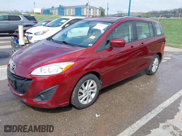 2012 Mazda 5 Sport with VIN JM1CW2BL9C0107471, listed as a IAAI auction lot 42021285 with 104,851 mi miles. Bid and sale history available at carsss.com. Image 18.