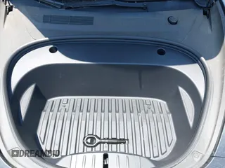 2023 Tesla Model 3 with VIN 5YJ3E1EA4PF400306, listed as a IAAI auction lot 42398603 with 18,551 mi miles and . Bid and sale history available at DreamBid. Image 10.