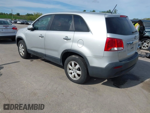 2011 Kia Sorento LX with VIN 5XYKT3A12BG160242, listed as a IAAI auction lot 42220874 with 142,298 mi miles and . Bid and sale history available at carsss.com. Image 3.
