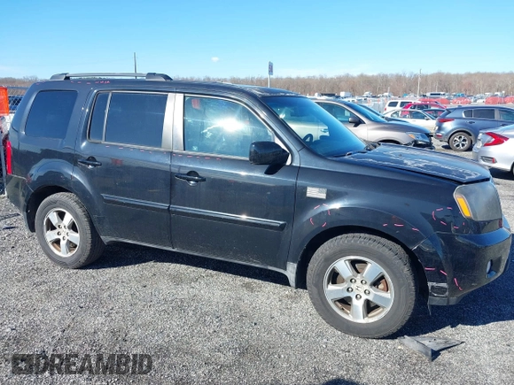 2011 Honda Pilot EX-L with VIN 5FNYF4H65BB004213, listed as a IAAI auction lot 41867681 with 157,644 mi miles and . Bid and sale history available at carsss.com. Image 13.