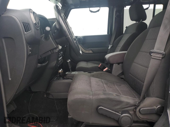 2012 Jeep Wrangler Unlimited Sport with VIN 1C4HJWDG8CL122067, listed as a Copart auction lot 58549805 with 124,658 mi miles and Clean title. Bid and sale history available at DreamBid. Image 7.