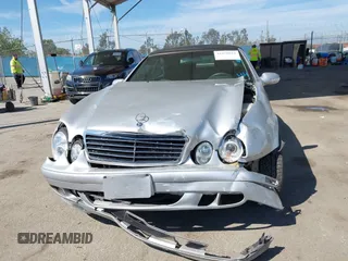 2000 Mercedes-Benz CLK with VIN WDBLK65G7YT051620, listed as a IAAI auction lot 41870818 with 141,676 mi miles. Bid and sale history available at carsss.com. Image 12.