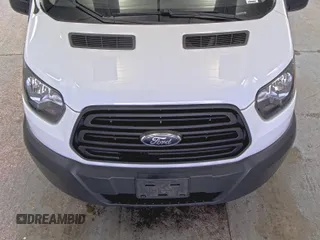 2019 Ford Transit with VIN 1FTYE1YM0KKB31938, listed as a IAAI auction lot 42667322 with 196,239 mi miles and . Bid and sale history available at DreamBid. Image 28.