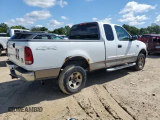 2004 Ford F-150 XL with VIN 2FTRX18W34CA64873, listed as a Copart auction lot 63946475 with 73,423 mi miles and Salvage title. Bid and sale history available at DreamBid. Image 3.