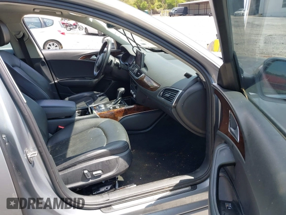 2016 Audi A6 Premium z VIN WAUCFAFC2GN111968, wystawiony jako IAAI lot #42003738 z przebiegiem 149 089 mil mil oraz . Historia ofert i sprzedaży dostępna na DreamBid. Obrazek 5.