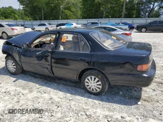 1994 Toyota Camry LE z VIN 4T1SK12E6RU408523, wystawiony jako Copart lot #56314665 z przebiegiem 221 867 mil mil oraz Szkoda całkowita • Salvage title. Historia ofert i sprzedaży dostępna na DreamBid. Obrazek 2.