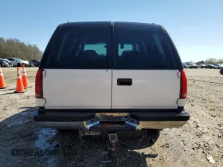 1997 GMC Yukon with VIN 1GKEK13R0VJ747359, listed as a Copart auction lot 48301095 with 272,417 mi miles and Salvage Title. Bid and sale history available at carsss.com. Image 6.