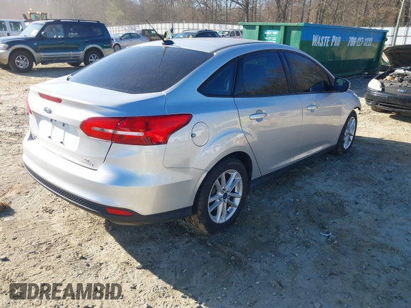 2016 Ford Focus SE with VIN 1FADP3F27GL390830, listed as a IAAI auction lot 41665012 with 119,673 mi miles. Bid and sale history available at carsss.com. Image 4.