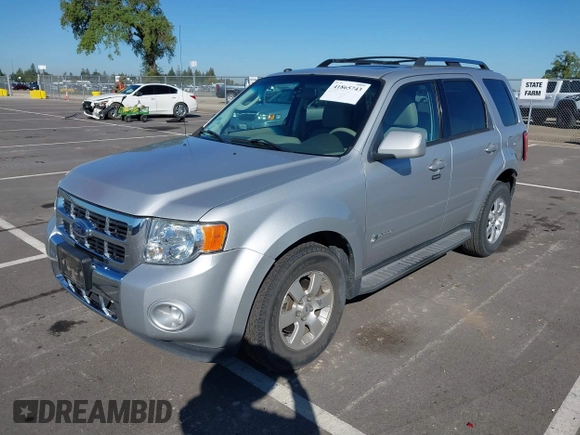 2009 Ford Escape Hybrid with VIN 1FMCU59349KA94375, listed as a IAAI auction lot 41865743 with 127,538 mi miles and . Bid and sale history available at DreamBid. Image 2.