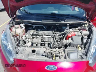 2017 Ford Fiesta SE z VIN 3FADP4EJ4HM168566, wystawiony jako IAAI lot #42223504 z przebiegiem 53 572 mil mil oraz . Historia ofert i sprzedaży dostępna na DreamBid. Obrazek 10.