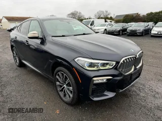 2021 BMW X6 M50i z VIN 5UXCY8C02M9D95172, wystawiony jako Copart lot #84796854 z przebiegiem 75 299 mil mil oraz Czysty tytuł • Clean title. Historia ofert i sprzedaży dostępna na DreamBid. Obrazek 4.