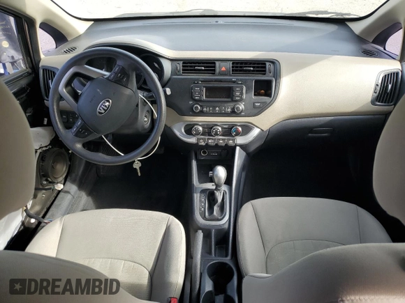 2014 Kia Rio LX with VIN KNADM4A36E6370196, listed as a Copart auction lot 52152155 with 123,672 mi miles and Salvage Title. Bid and sale history available at DreamBid. Image 8.
