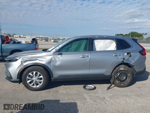 2024 Honda CR-V LX with VIN 2HKRS3H21RH308688, listed as a IAAI auction lot 41350785 with 19,835 mi miles and . Bid and sale history available at DreamBid. Image 6.