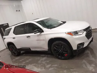 2018 Chevrolet Traverse Premier z VIN 1GNEVJKW4JJ163087, wystawiony jako IAAI lot #41509692 z przebiegiem 118 158 mil mil oraz . Historia ofert i sprzedaży dostępna na DreamBid. Obrazek 13.