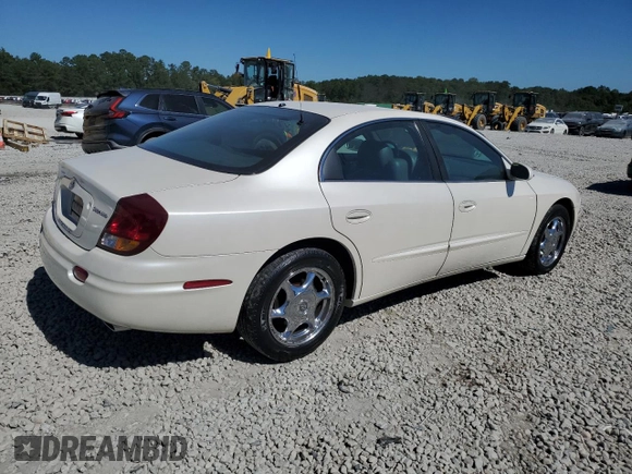 2003 Oldsmobile Aurora z VIN 1G3GS64CX34163493, wystawiony jako Copart lot #75863314 z przebiegiem 211 607 mil mil oraz Szkody całkowita. Historia ofert i sprzedaży dostępna na DreamBid. Obrazek 3.
