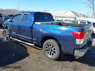 2013 Toyota Tundra 4WD Truck with VIN 5TFUM5F14DX043076, listed as a IAAI auction lot 41633905 with 157,850 mi miles. Bid and sale history available at carsss.com. Image 3.