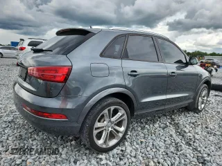 2018 Audi Q3 Premium z VIN WA1BCCFS3JR015478, wystawiony jako Copart lot #59613945 z przebiegiem 96 841 mil mil oraz Szkoda całkowita • Salvage title. Historia ofert i sprzedaży dostępna na DreamBid. Obrazek 3.