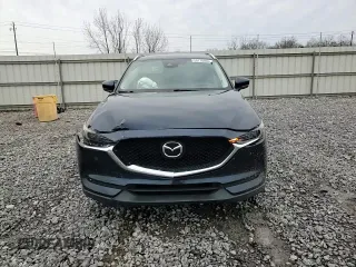 2017 Mazda CX-5 Grand Touring with VIN JM3KFADL3H0125143, listed as a Copart auction lot 50178005 with 160,058 mi miles and Salvage Title. Bid and sale history available at carsss.com. Image 11.