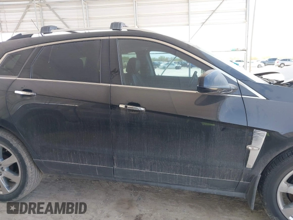 2012 Cadillac SRX Premium Collection with VIN 3GYFNCE39CS548523, listed as a IAAI auction lot 41854695 with 145,311 mi miles and . Bid and sale history available at DreamBid. Image 13.