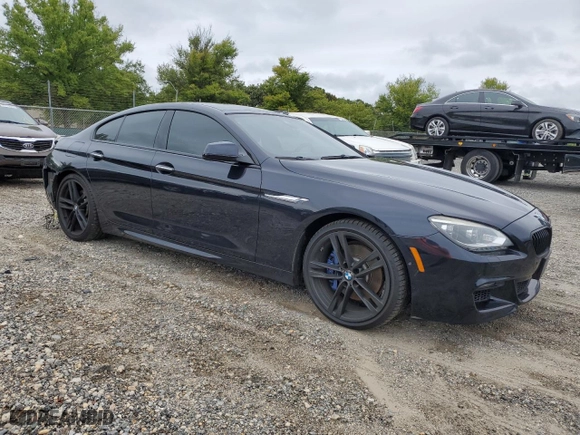 2014 BMW 6 Series 640i xDrive with VIN WBA6B8C51ED452692, listed as a Copart auction lot 72366124 with 123,101 mi miles and Salvage Title. Bid and sale history available at carsss.com. Image 4.