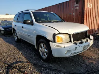 2003 GMC Envoy SLE z VIN 1GKDS13S532369187, wystawiony jako Copart lot #79922934 z przebiegiem 223 997 mil mil oraz Szkoda całkowita • Salvage title. Historia ofert i sprzedaży dostępna na DreamBid. Obrazek 4.
