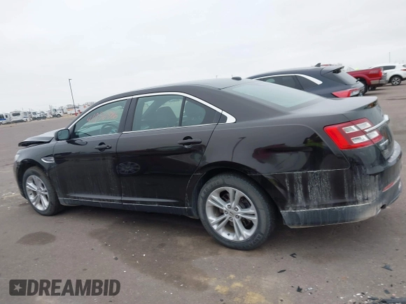 2014 Ford Taurus SEL z VIN 1FAHP2E85EG121636, wystawiony jako IAAI lot #41036886 z przebiegiem 117 460 mil mil oraz . Historia ofert i sprzedaży dostępna na DreamBid. Obrazek 14.