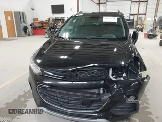 2020 Chevrolet Trax LT z VIN KL7CJLSB0LB092579, wystawiony jako IAAI lot #42038124 z przebiegiem 101 605 mil mil oraz . Historia ofert i sprzedaży dostępna na DreamBid. Obrazek 13.